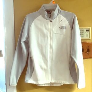 woman’s white north face jacket
